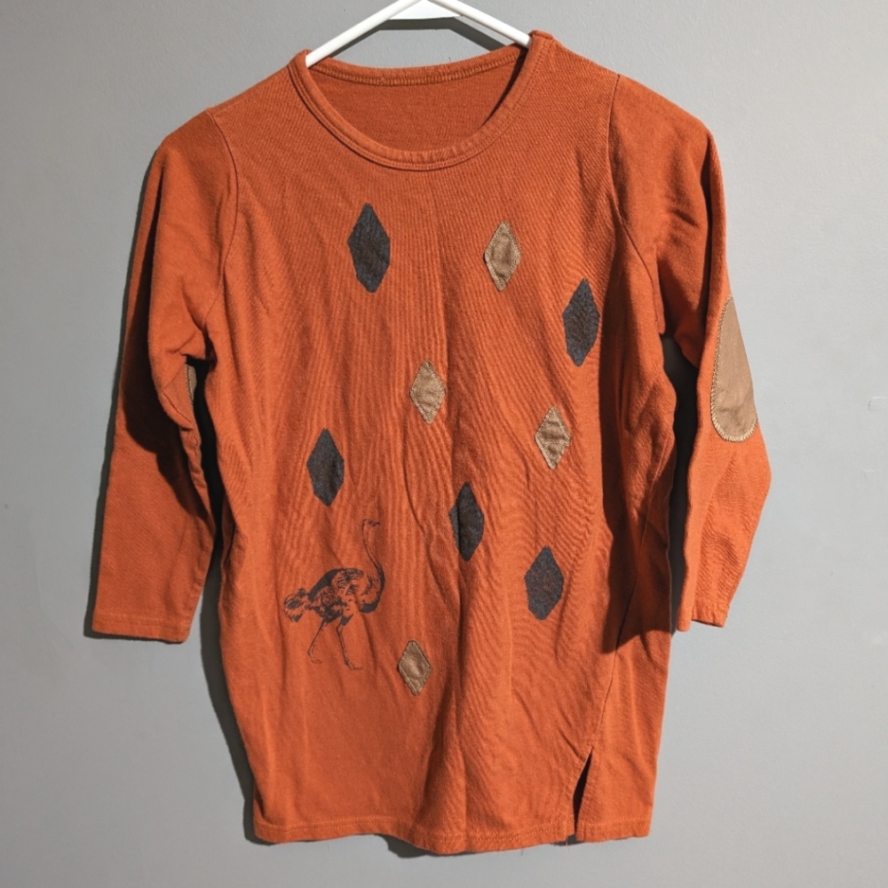 Unique orange shirt with ostritch